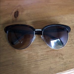 Diane Von Furstenberg sunglasses with case.